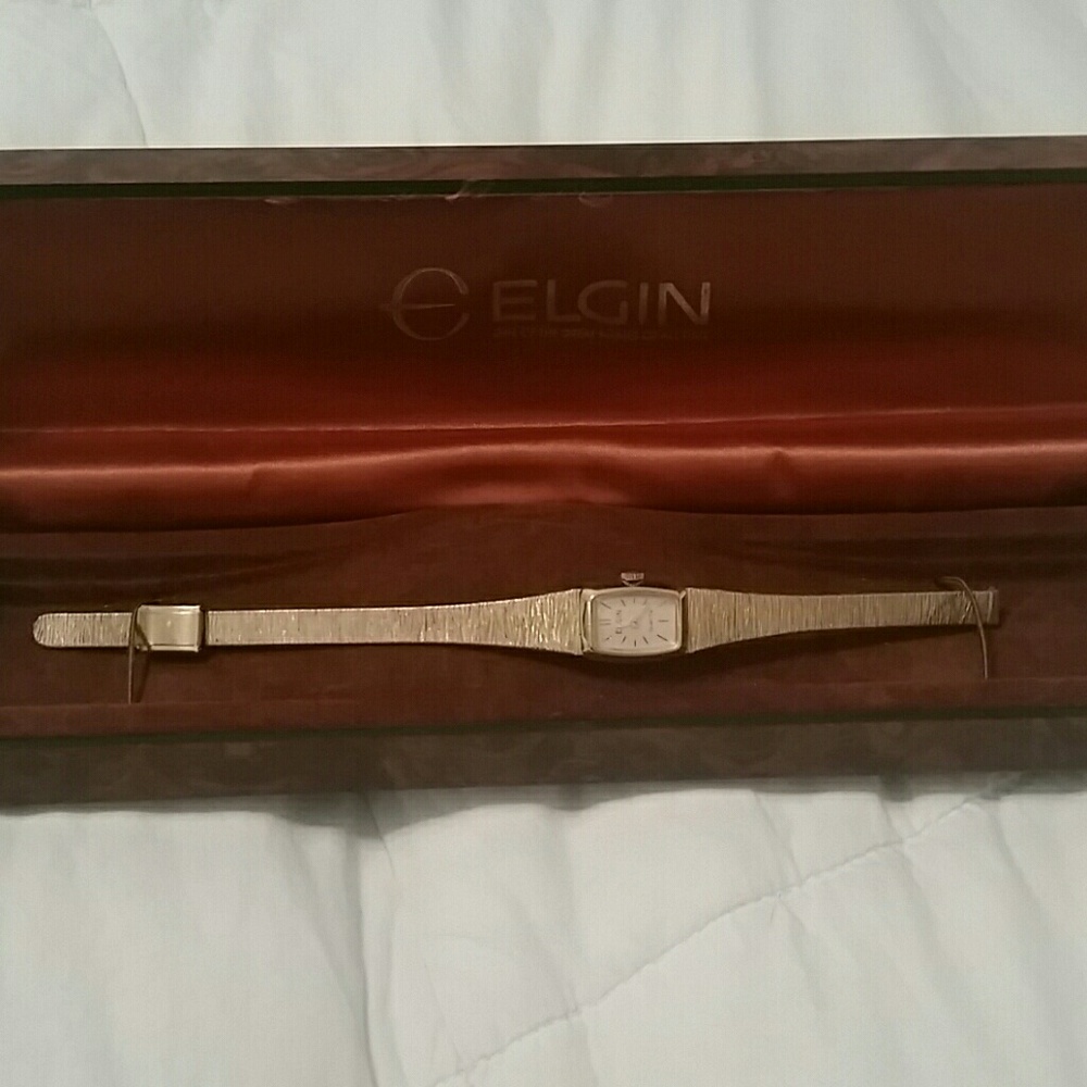 Wrist watch in original box.